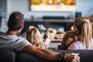 happy family watching tv