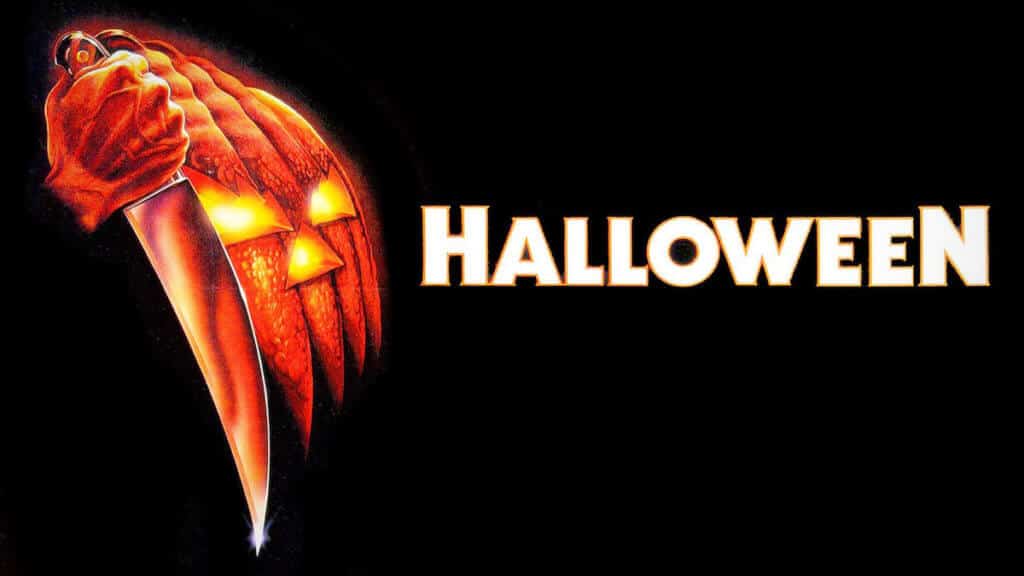 original poster art for Halloween movie featuring slashing pumpkin