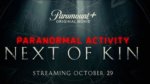 logo for Paranormal Activity: Next of Kin over a shadowy wall of symbols