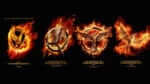 row of hunger games logo posters
