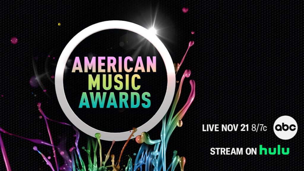 American Music Awards logo with splashing rainbow liquid