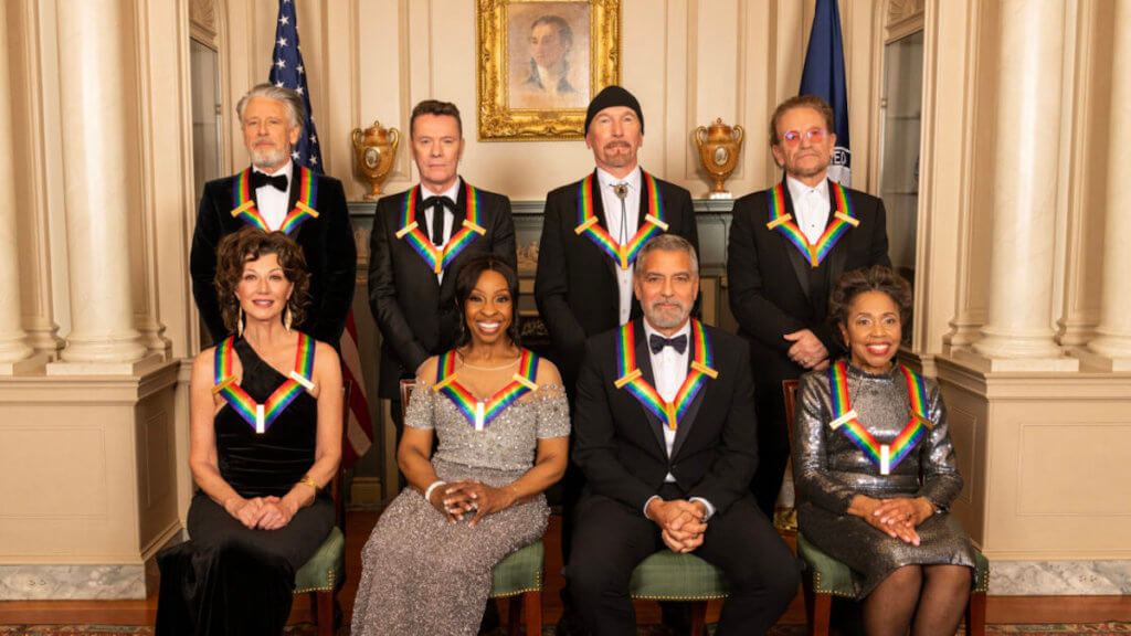 Eight Kennedy Center Honorees wearing their ribbon medals