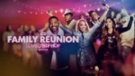 Group of people partying under logo for VH1 Family reunion