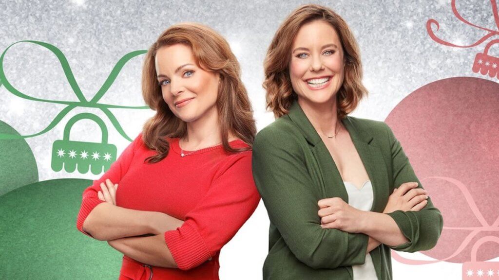 Real life actor sisters posing as Hallmark christmas movie sisters