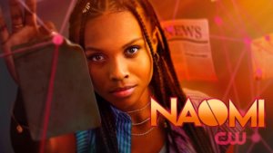 a young black woman faces the camera in cool comic style setting with NAOMI title