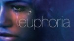 A close up of a woman's face with a tear streak and word Euphoria