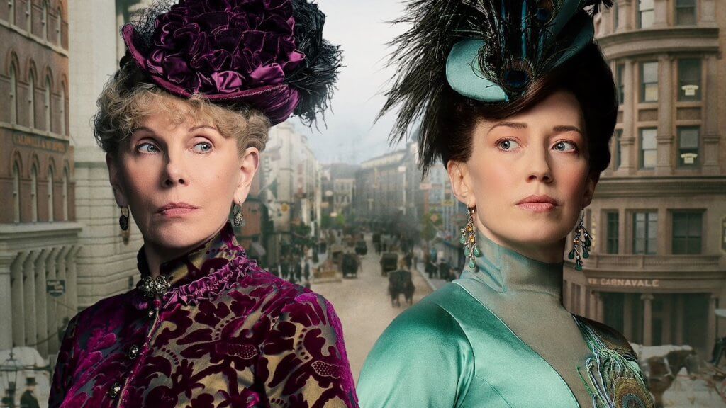 Two women in 19th c gowns look askance at one another