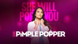 A female doctor pops her collar in front of a bright pink phrase "She will pop you"