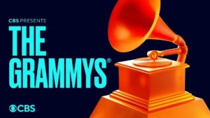 The Grammys award in orange on a black background