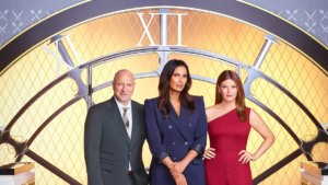 Top Chef Judges and Hosts in front of large clock