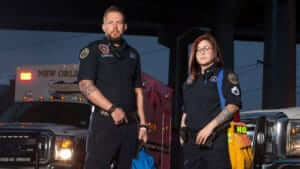 Two first responders at dusk