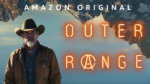An older cowboy in front of upside down mountains