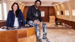 DJ Lil Jon and builder Anitra Mecadon in a partially remodeled space