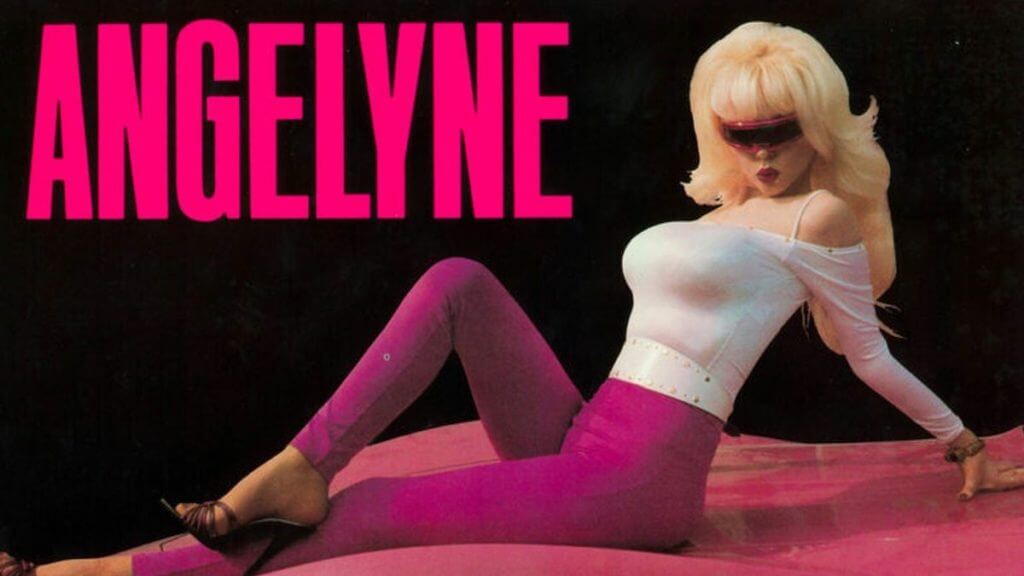A mysterious Blonde bombshell poses with dark sunglasses and the word Angelyne