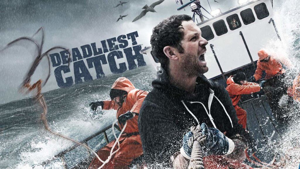 Intense action shot of fishermen in choppy sea