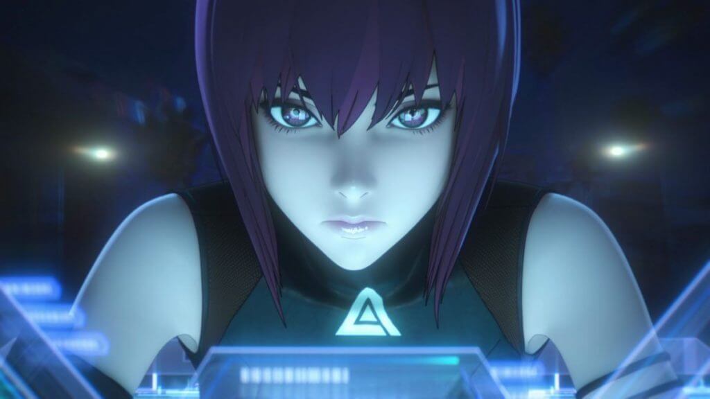 An anime still of a girl looking into a computer monitor