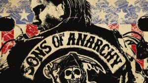 a block print style poster of the back of a biker with American flag print behind him