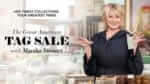 Martha Stewart holding price tags over table of housewares