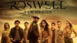 The cast of Roswell, New Mexico, in front of a desert sky