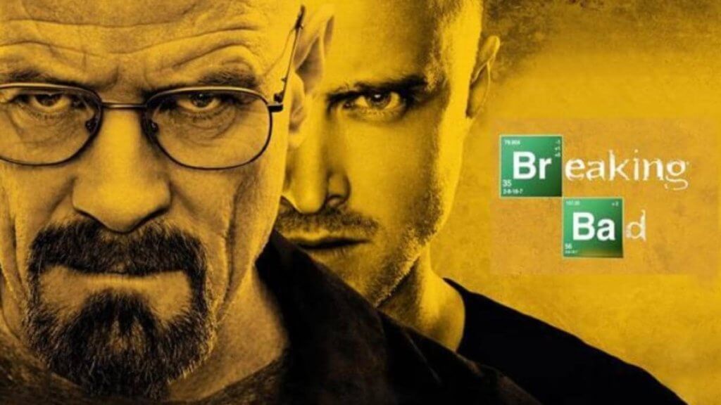 Two men stare down the camera next to logo for Breaking Bad