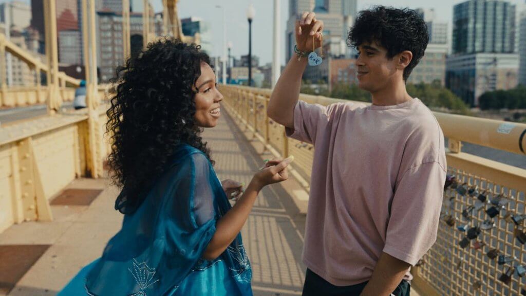 A Young couple on a lock bridge