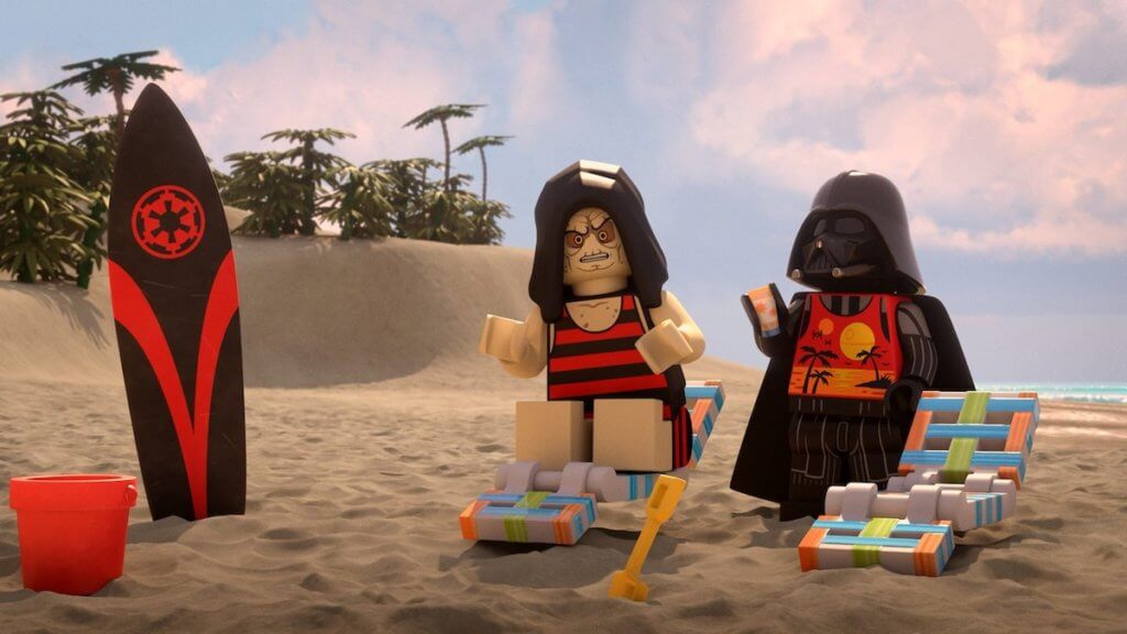 Two Star Wars villains in lego form on a beach