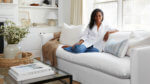 Designer Keyanna Bowen in a striking white living room