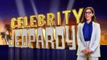 Miyam Bialik in front of Celebrity Jeopardy show logo