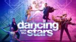Three pairs of dancers on a rainbow background and a Micky disco ball