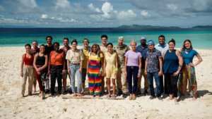 A group of contestants for season 43 of survivor on a beach