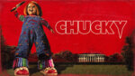 Horror doll Chucky wields a knife above the camera with a red background and the White House in the distance.