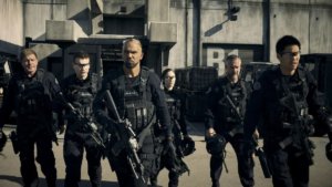 A group of 7 heavily armed and armored SWAT agents