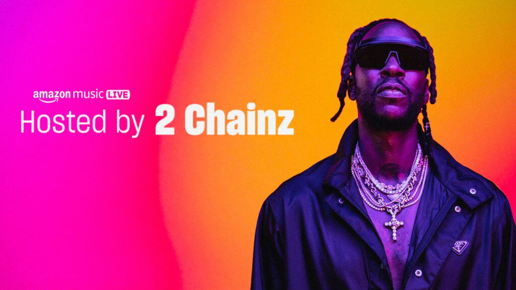 Rapper 2 Chainz on a vibrant pink and orange background