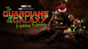 Two characters from Guardians of the Galaxy asleep against each other covered in Christmas lights
