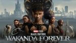 The stars of Black Panther: Wakanda Forever, with a city silhouetted behind them and a row of warriors below.