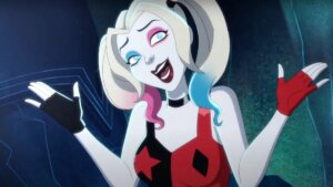 Animated character Harley Quinn shrugging shoulders with a goofy expression on her face.