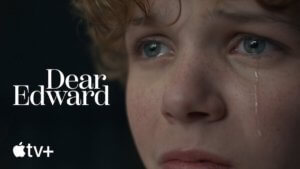 Show title next to a close up of a young boys face with a single tear falling.