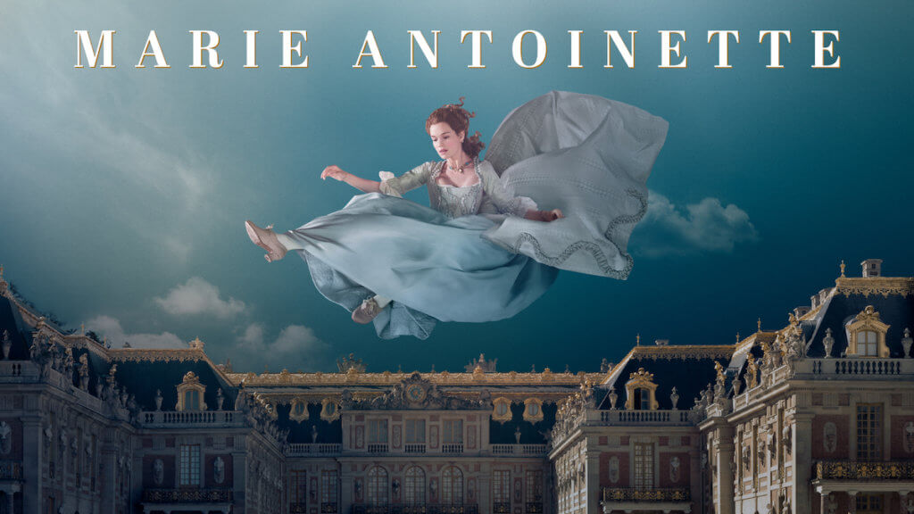 A woman dressed as Marie Antoinette floating in the sky over Versailles