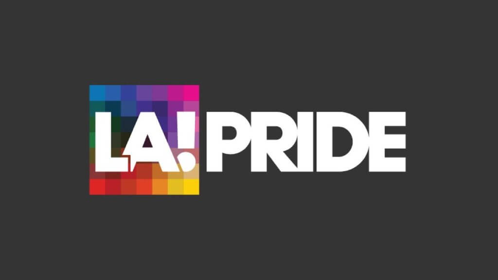 logo for LA Pride with rainbow pixel box under the LA!