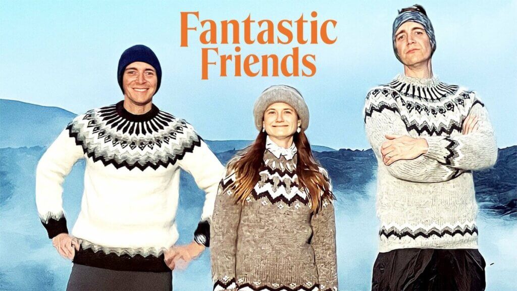 James and Oliver Phelps flank a fellow Harry Potter star on a mountain, all dressed in Nordic sweaters and knit hats