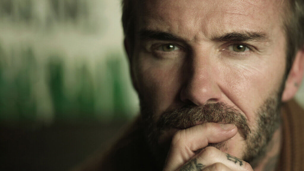 Footballer David Beckham in an extreme close up looking pensive