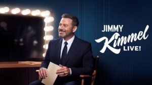 Host Jimmy Kimmel sitting at a dressing room mirror.